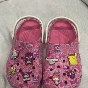Pink sanrio/Hello Kitty Crocs with Charms Perfect like new condition worn once